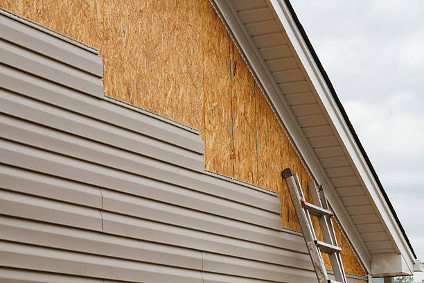 Professional Emergency Siding Repair technician working in Oxford, PA